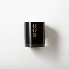 Load image into Gallery viewer, Large soy candle on white background. Black gloss finished glass jar with bronze Ode logo
